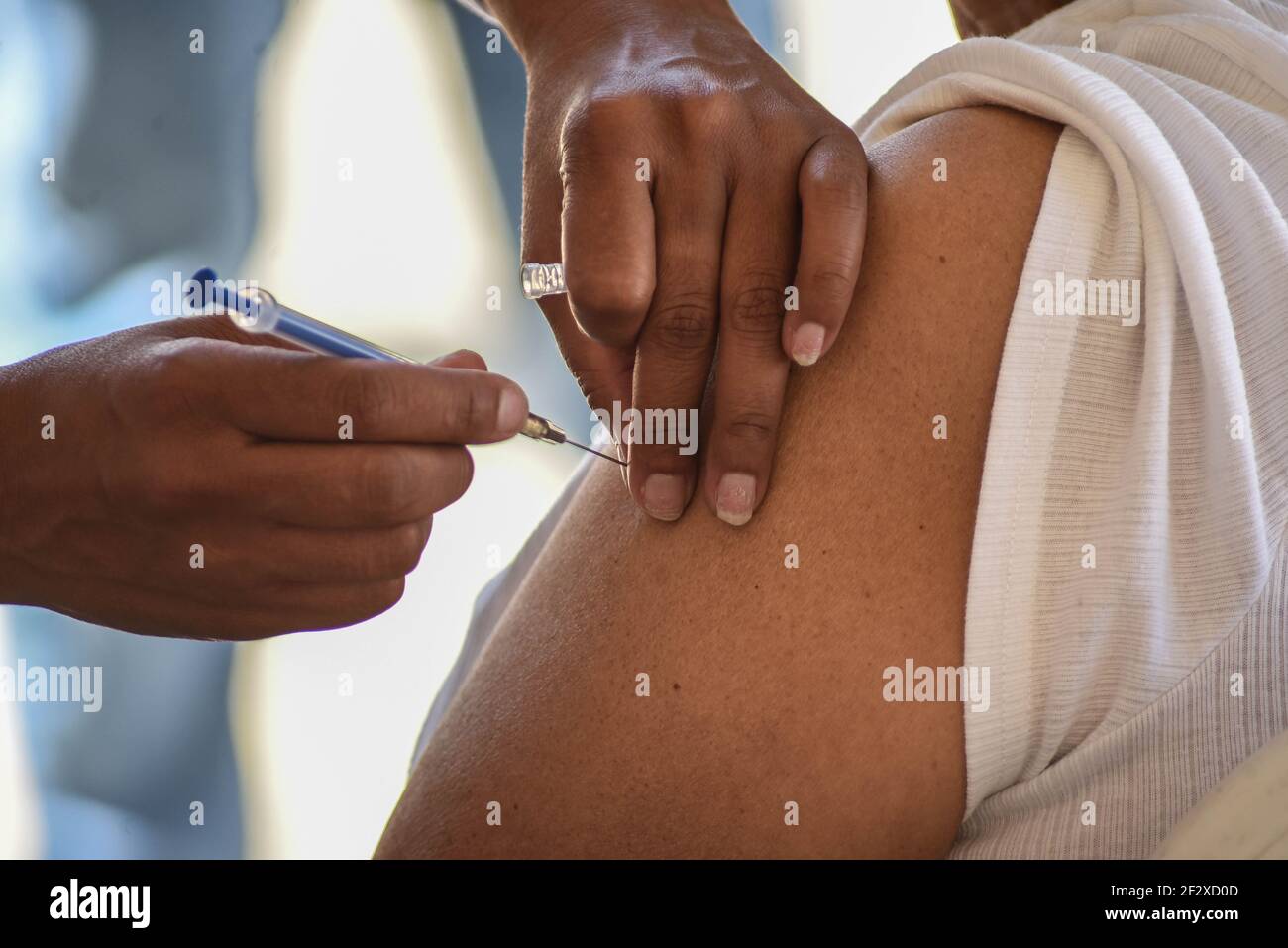 Xalapa, Mexico. March 13, 2021: Thousands of older adults received the COVID-19 vaccine in the city of Xalapa. From early on they made lines and for their application they were sanitized and did body activation exercises. Credit: Hector Adolfo Quintanar Perez/ZUMA Wire/Alamy Live News Stock Photo