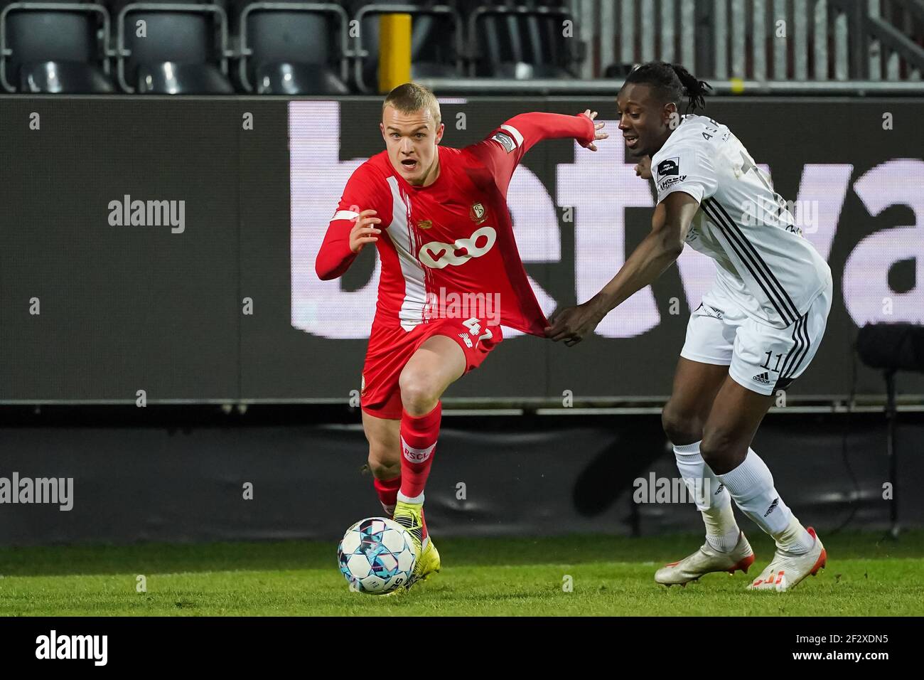 EUPEN, BELGIUM MARCH 13 Hugo Siquet of Standard de Liege and Amara