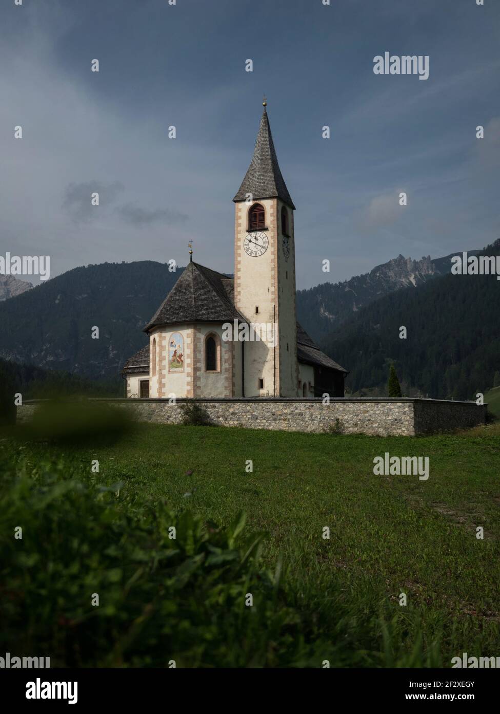 Panorama view of idyllic white alpine mountain chapel church in San Vito di Braies Prags Pustertal Val Pusteria South Tyrol Alto Adige Italy Europe Stock Photo