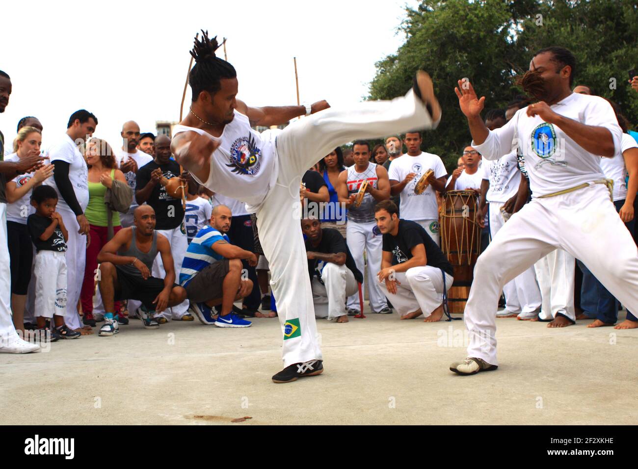 Men perform a martial arts demonstration at Brazil Fest in Young Circle