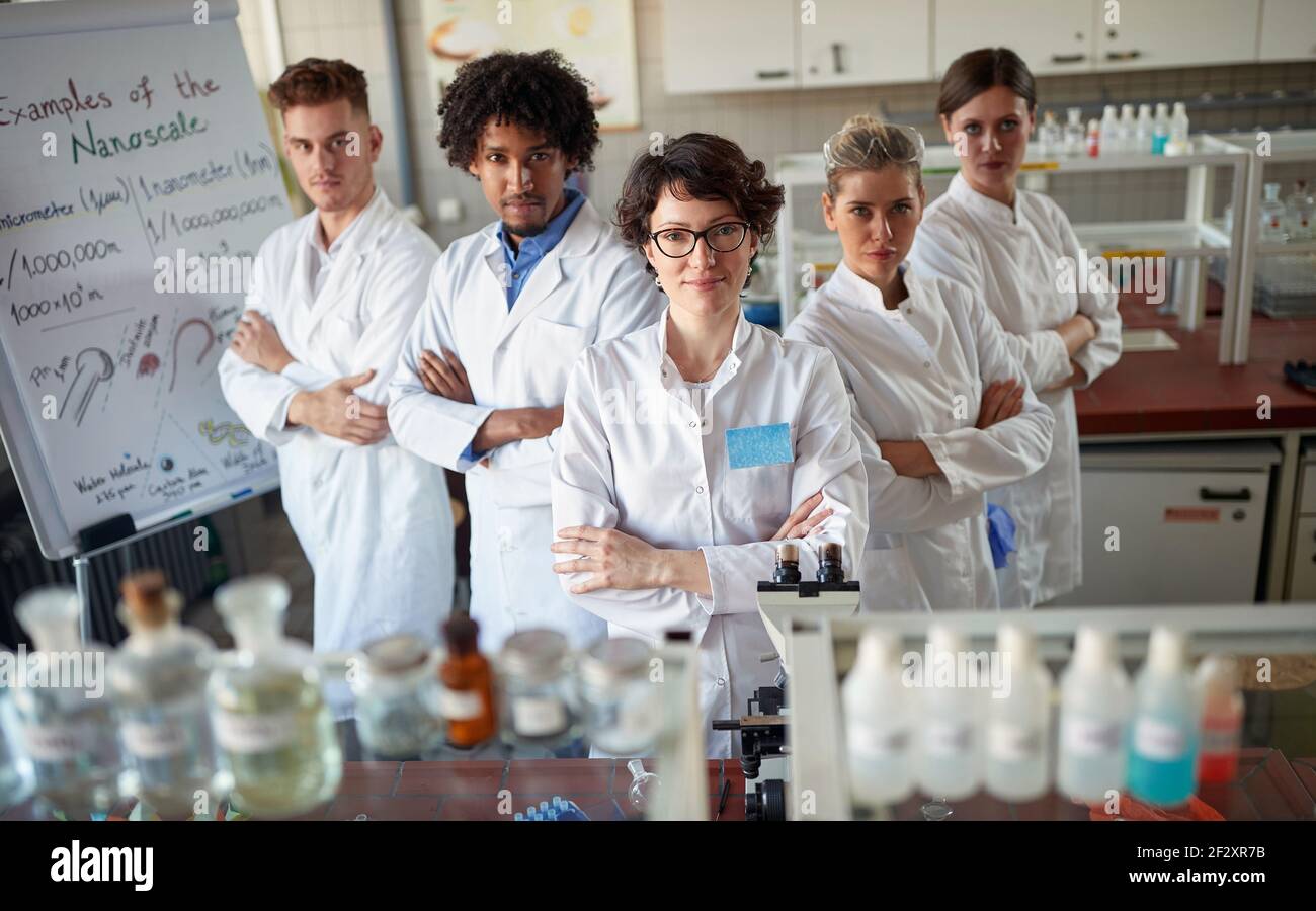 Team of young laboratory technicians in the lab Stock Photo Alamy
