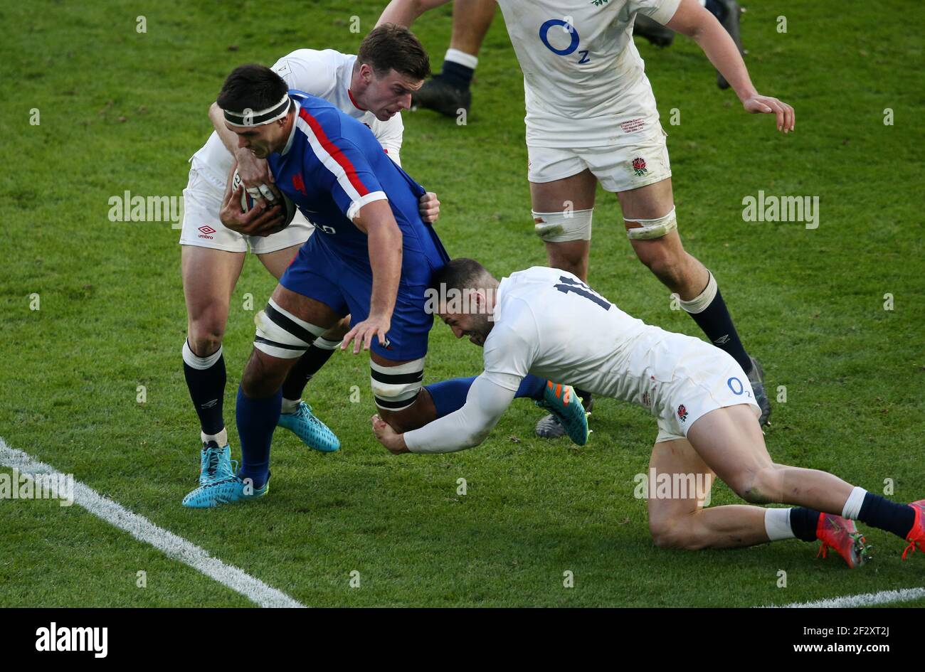 London, England, 13th March 2021, Rugby Union, Guinness Six Nations Championship, England v France, Twickenham, 2021, 13/03/2021 Dylan Cretin of France is tackled by George Ford and Jonny May of England CreditPaul