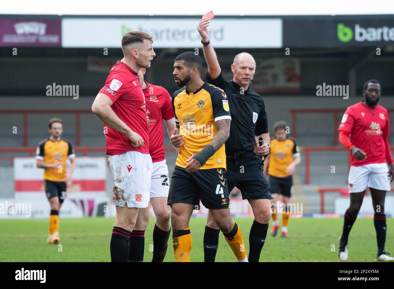 Morecambe, UK. 13th Mar, 2021. Samuel Lavelle of Morecambe (l) is shown a red card and sent off. EFL Skybet Football league two match, Morecambe v Newport County at the Mazuma Stadium in Morecambe, Lancashire on Saturday 13th March 2021. this image may only be used for Editorial purposes. Editorial use only, license required for commercial use. No use in betting, games or a single club/league/player publications.pic by Credit: Andrew Orchard sports photography/Alamy Live News Stock Photo