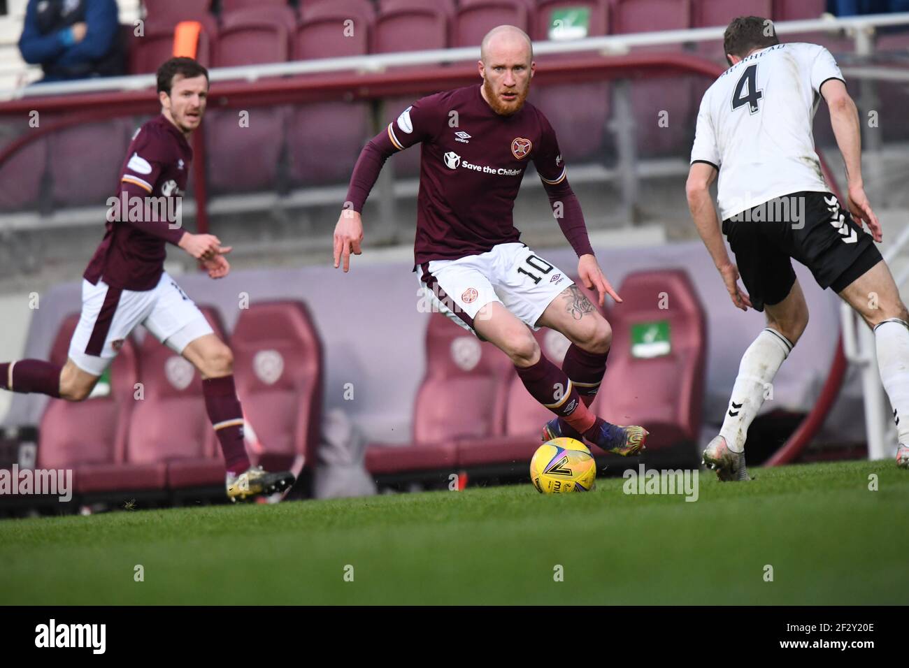 Tynecastle Park, Edinburgh, Scotland. UK .13th March 21. Scottish Championship Match .Hearts vs Ayr Utd Hearts' Irish International, Liam Boyce Credit: eric mccowat/Alamy Live News Stock Photo