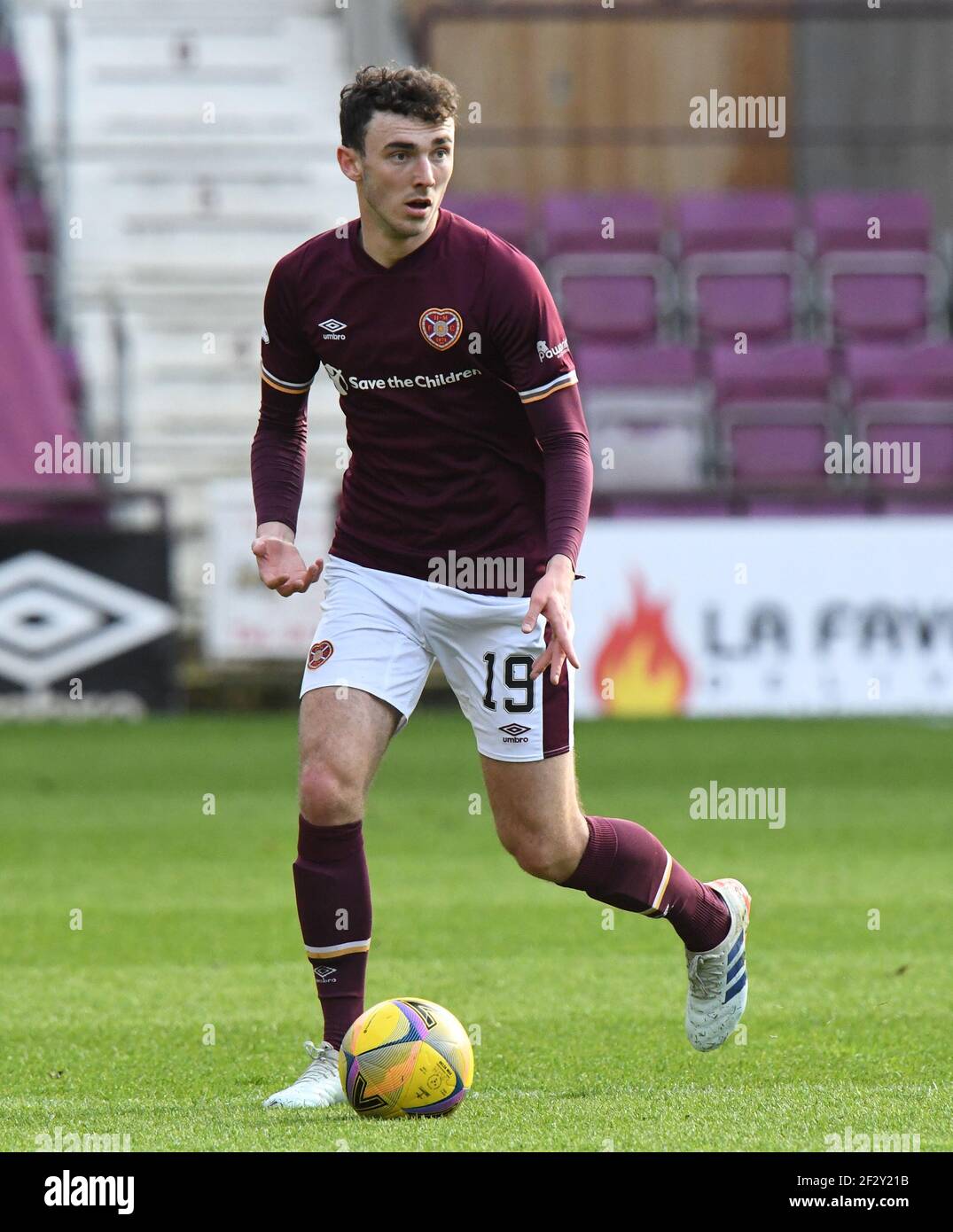 Tynecastle Park, Edinburgh, Scotland. UK .13th March 21. Scottish Championship Match .Hearts vs Ayr Utd Hearts' midfielder, Andy Halliday, Credit: eric mccowat/Alamy Live News Stock Photo