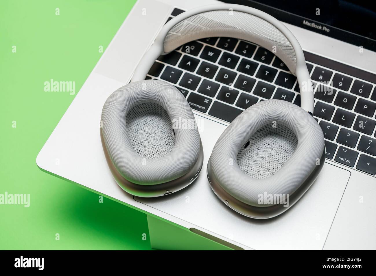 AirPods Max wireless Bluetooth over-ear headphones on MacBook Pro Stock  Photo - Alamy