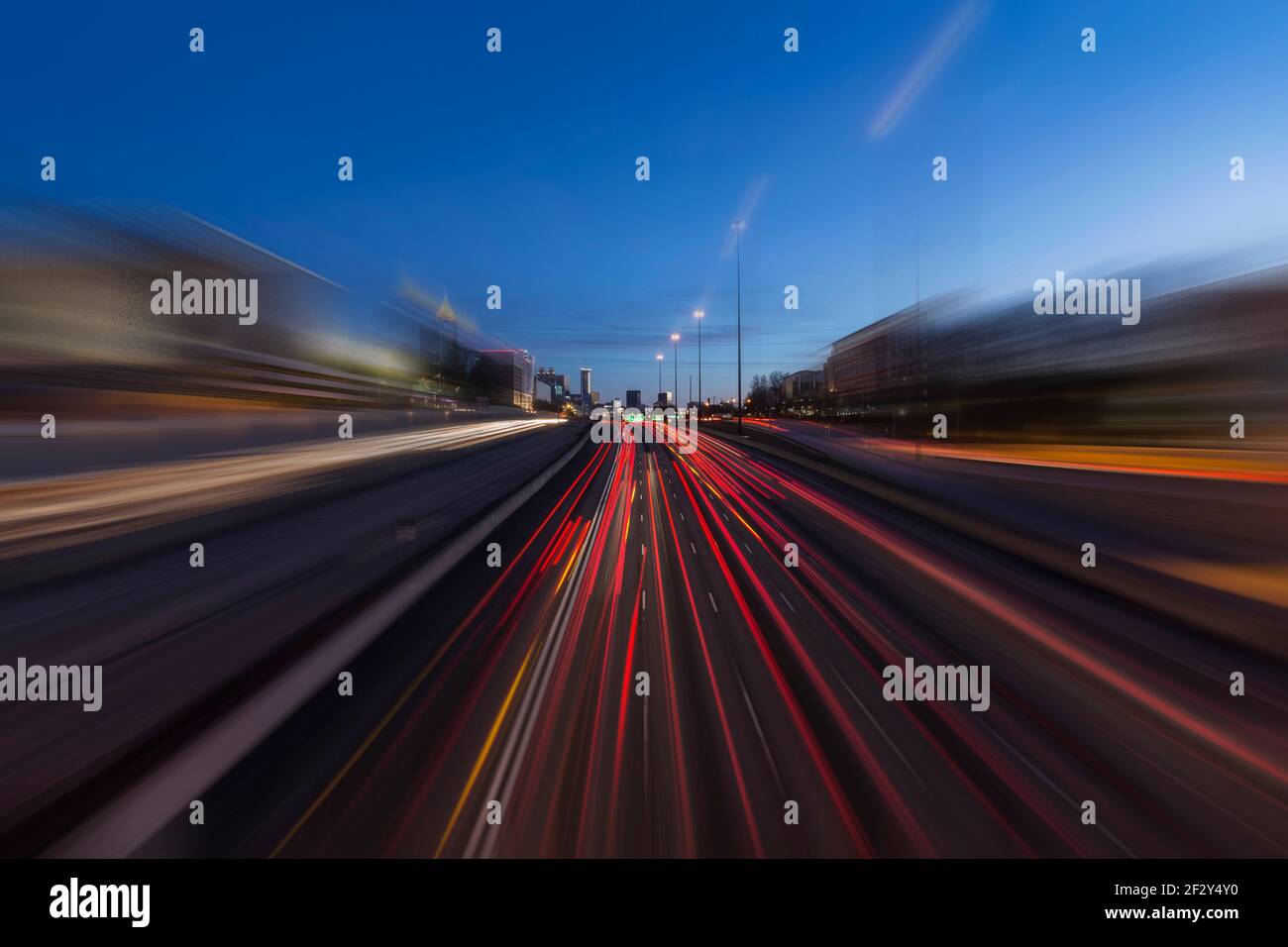 Night view of Interstate 75 and 85 freeways with motion blur near downtown Atlanta Georgia. Stock Photo