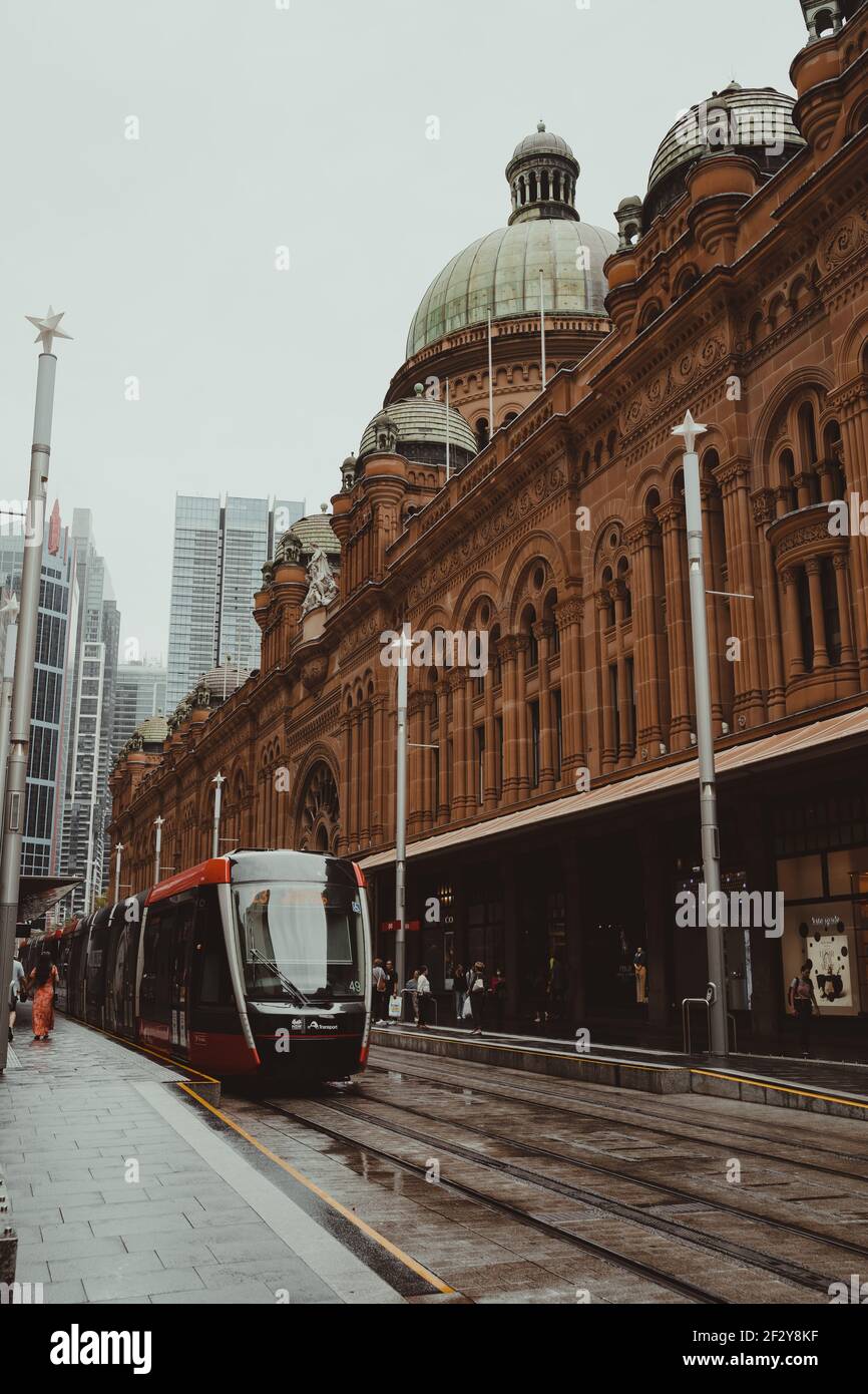 Light rail car sits at the Queen Victoria Building QVB stop in Sydney's