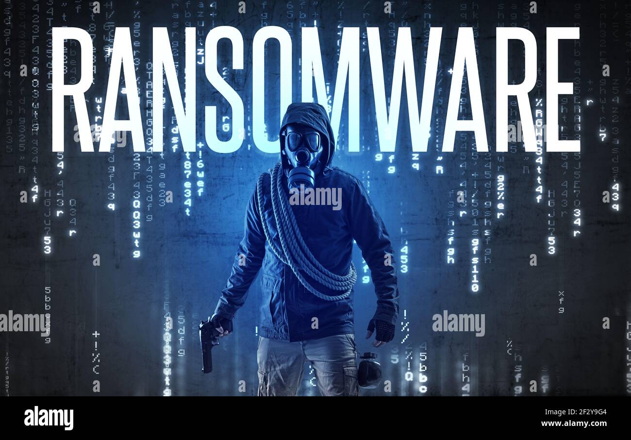 Faceless hacker with inscription Stock Photo