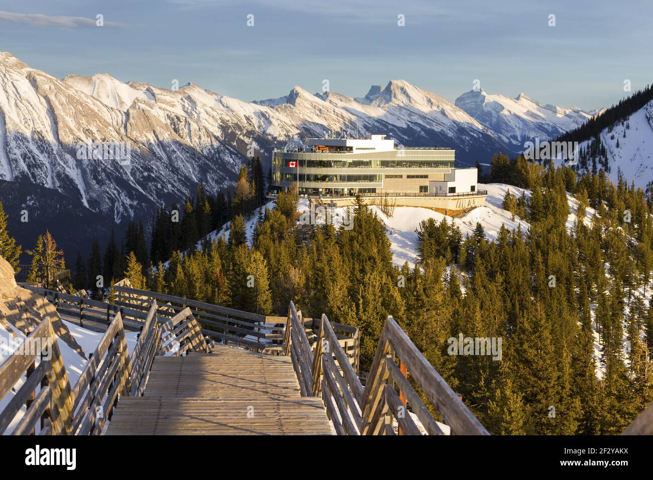 Sulphur Mountain Boardwalk and Gondola Station Upper Terminal above City of Banff, Alberta. Scenic Winter Landscape Panorama high in Canadian Rockies Stock Photo