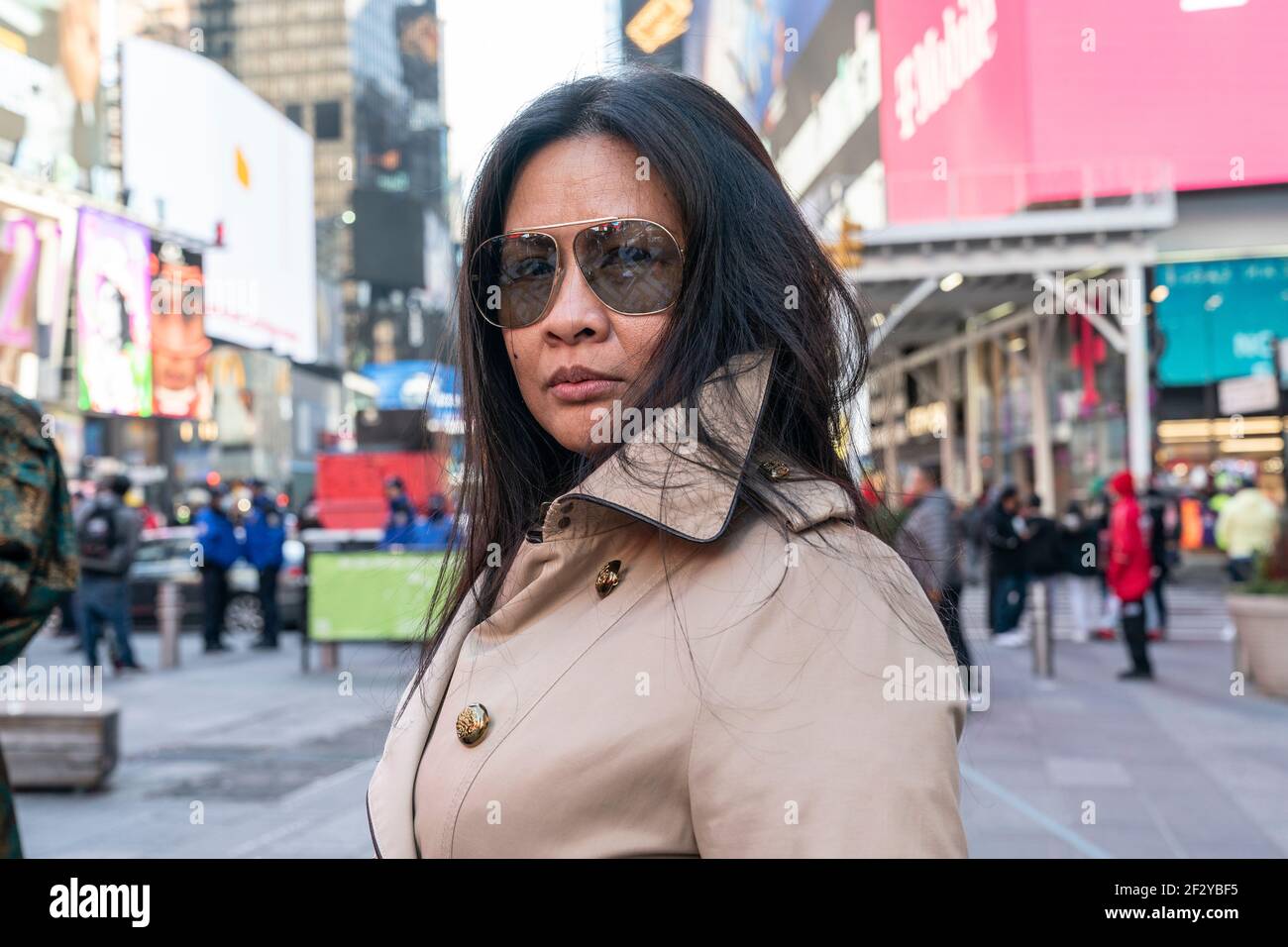 New York, NY - March 13, 2021: Designer Veronica Adamo presents her fashion  dresses on Times Square while protest for Breonna Taylor unfolds on  background Stock Photo - Alamy