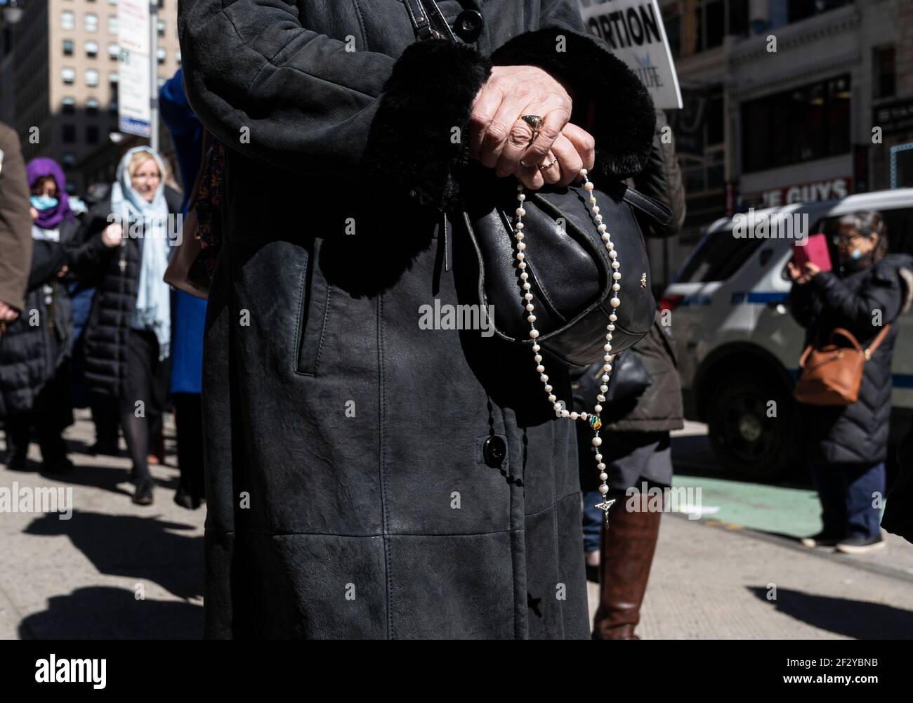 New York, NY - March 13, 2021: Clergy and members of Roman Catholic Church The Holy Innocents march and pray to end abortion on Midtown streets Stock Photo