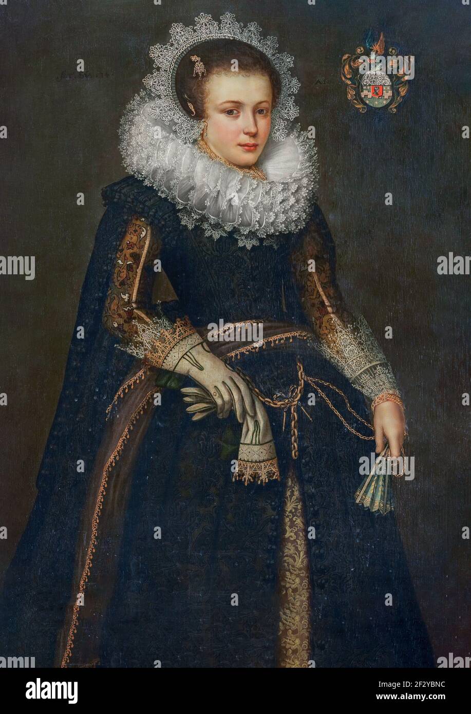 Portrait of Mertijntje van Ceters (1609-24). Sister of Johan van Ceters. Knee pad, standing to the right. Glove in the right hand, a fan in the left h Stock Photo