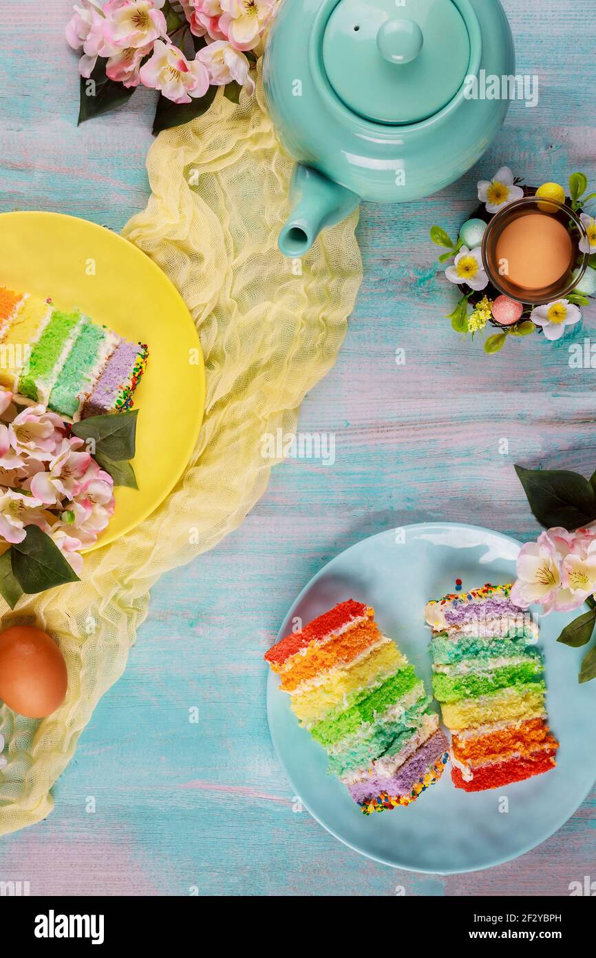 Beautiful Easter cakes with eggs and flowers. Top view. Stock Photo