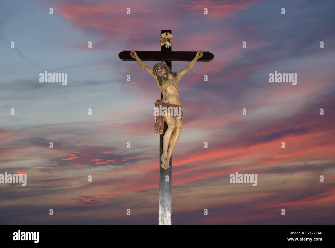 Crucifixion jesus christ statue on the sky background Stock Photo - Alamy