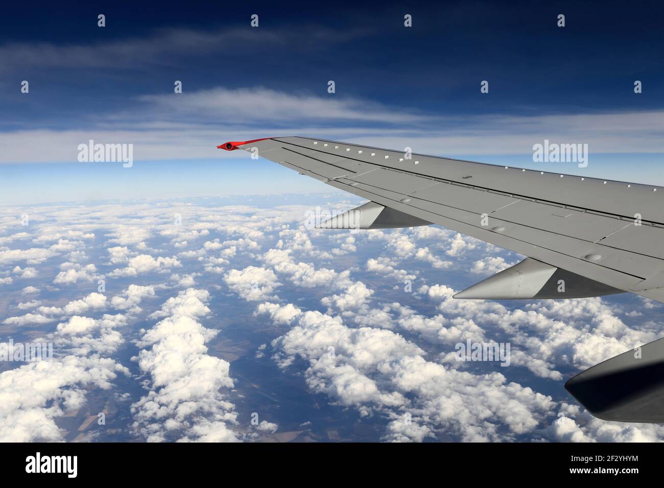 View of wing aircraft on the sky background Stock Photo - Alamy