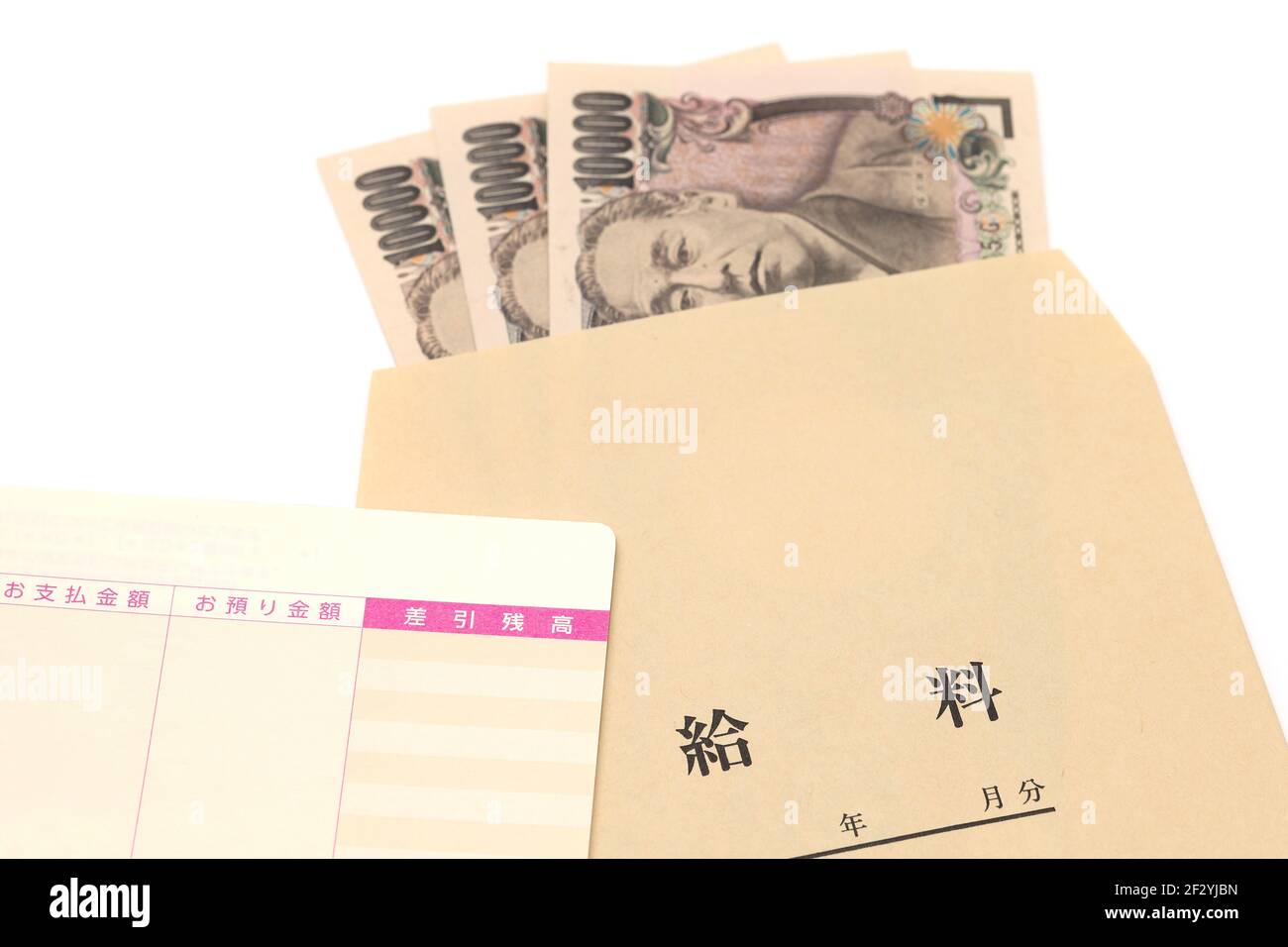 Japanese ten thousand yen in a salary bag on white background, Translation: year, month, day, payment, deposit, balance, salary. Stock Photo