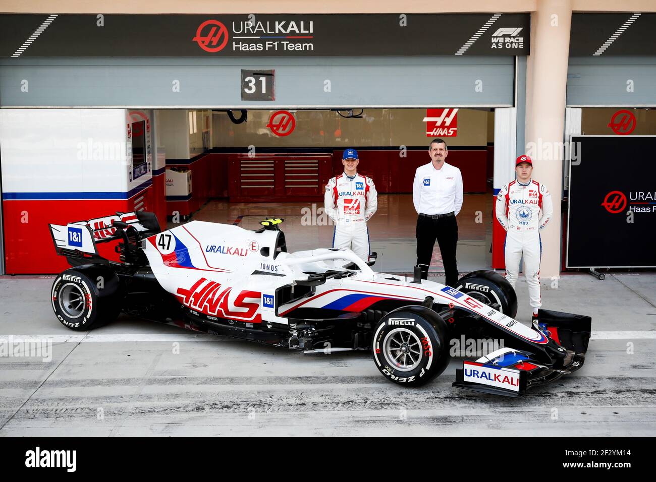 BAHRAIN INTERNATIONAL CIRCUIT, BAHRAIN - MARCH 12: Mick Schumacher, Haas F1,  Guenther Steiner, Team Principal, Haas F1 and Nikita Mazepin, Haas F1 Ionos  reveal during the Bahrain March testing at Bahrain International