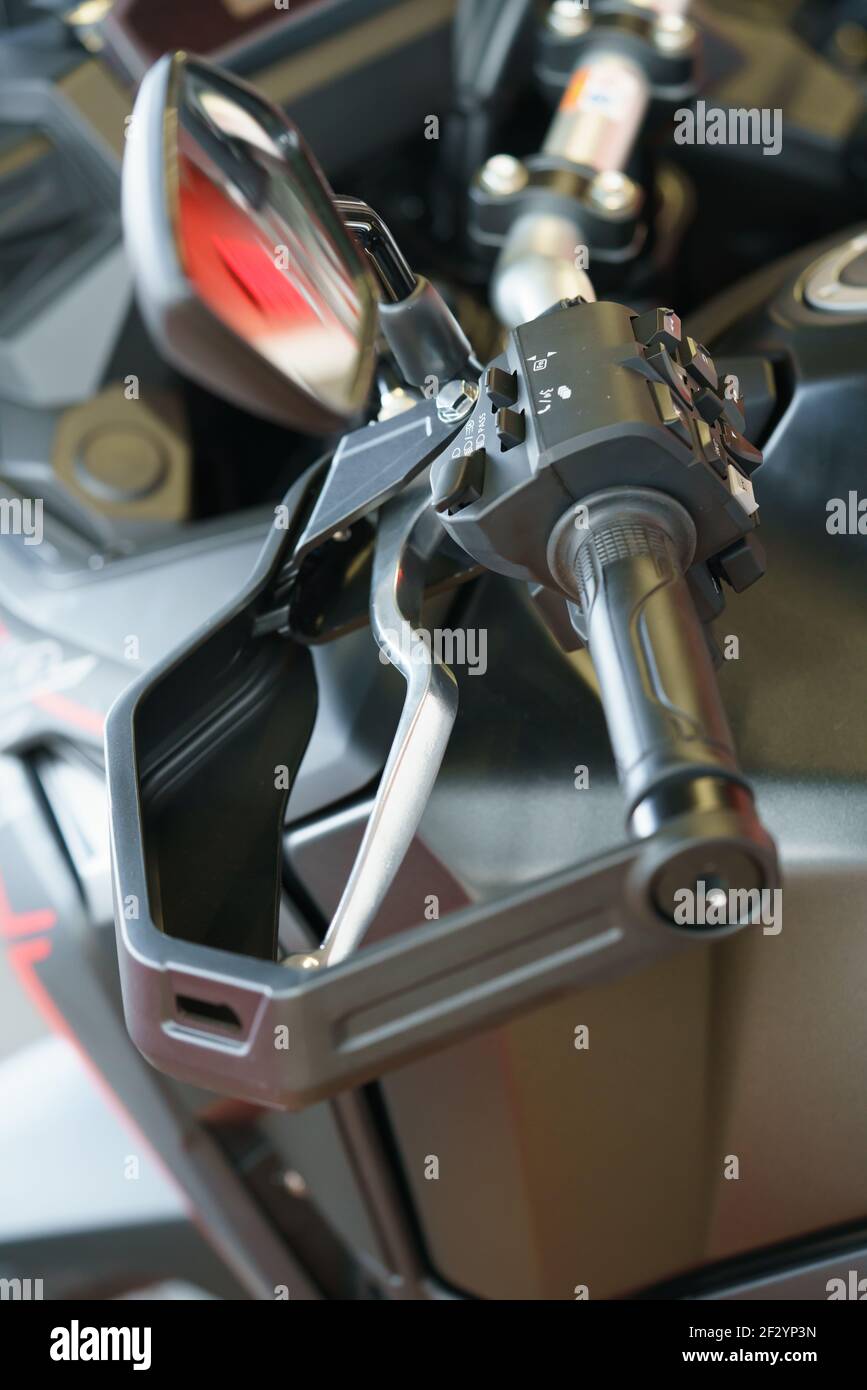 Elements of the steering wheel of a motorcycle. Clutch handle and