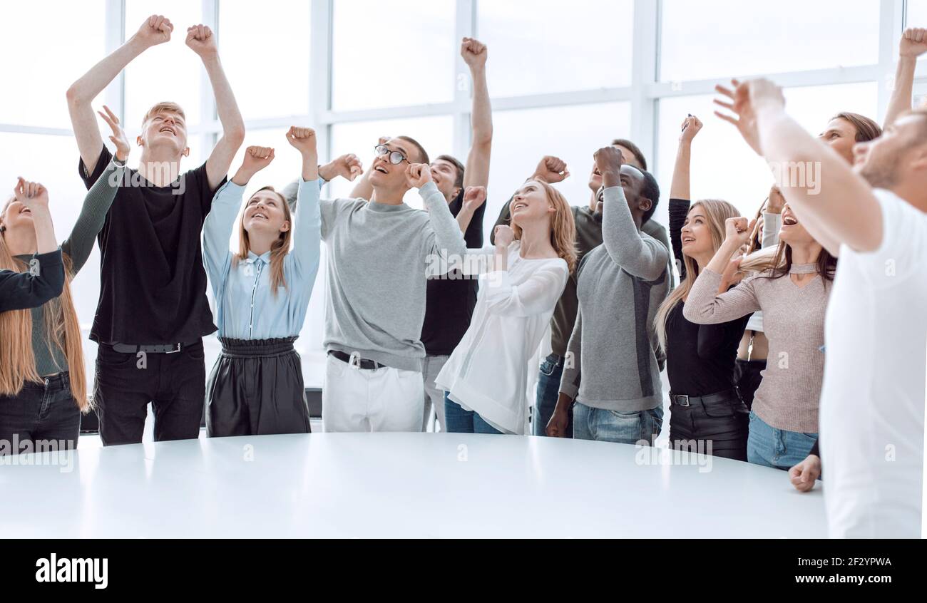 happy group of young people looking somewhere up Stock Photo - Alamy