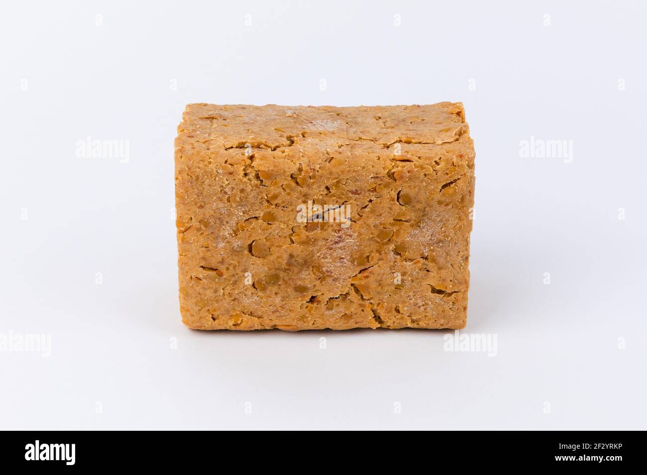 Meju front closeup on white background. Korean traditional fermented soybean food. Stock Photo