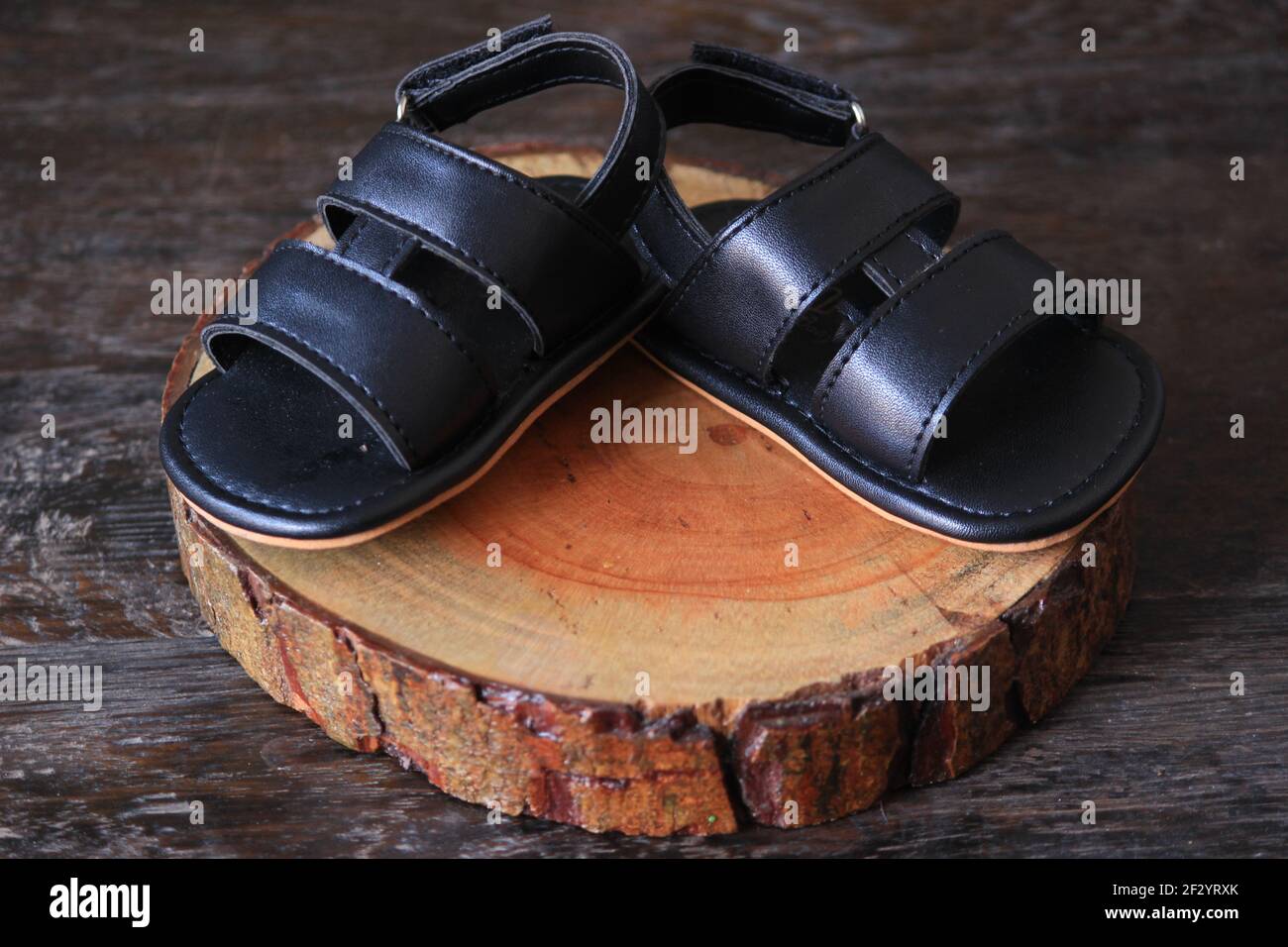 a pair of sandals with the theme of a unique traditional style from Indonesian Java. Stock Photo