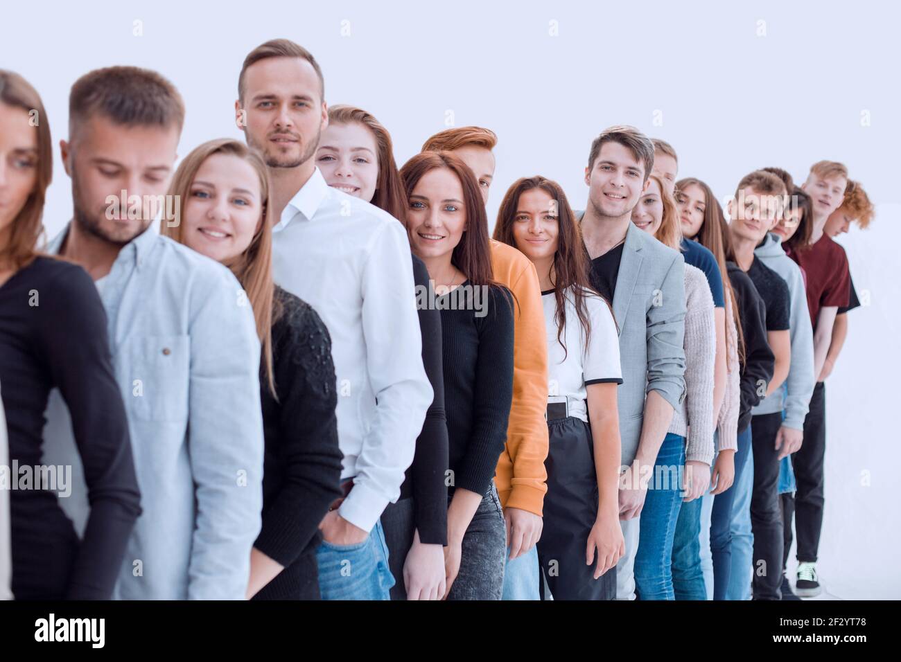 group of diverse young people standing in line Stock Photo - Alamy