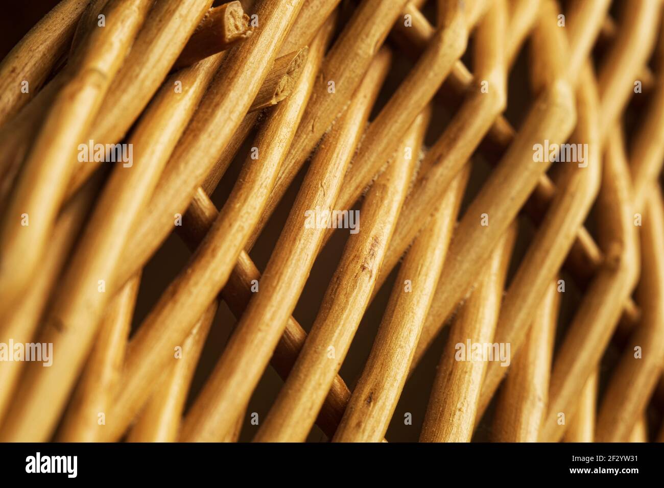 Brown willow twigs woven together with selective focus closeup Stock Photo