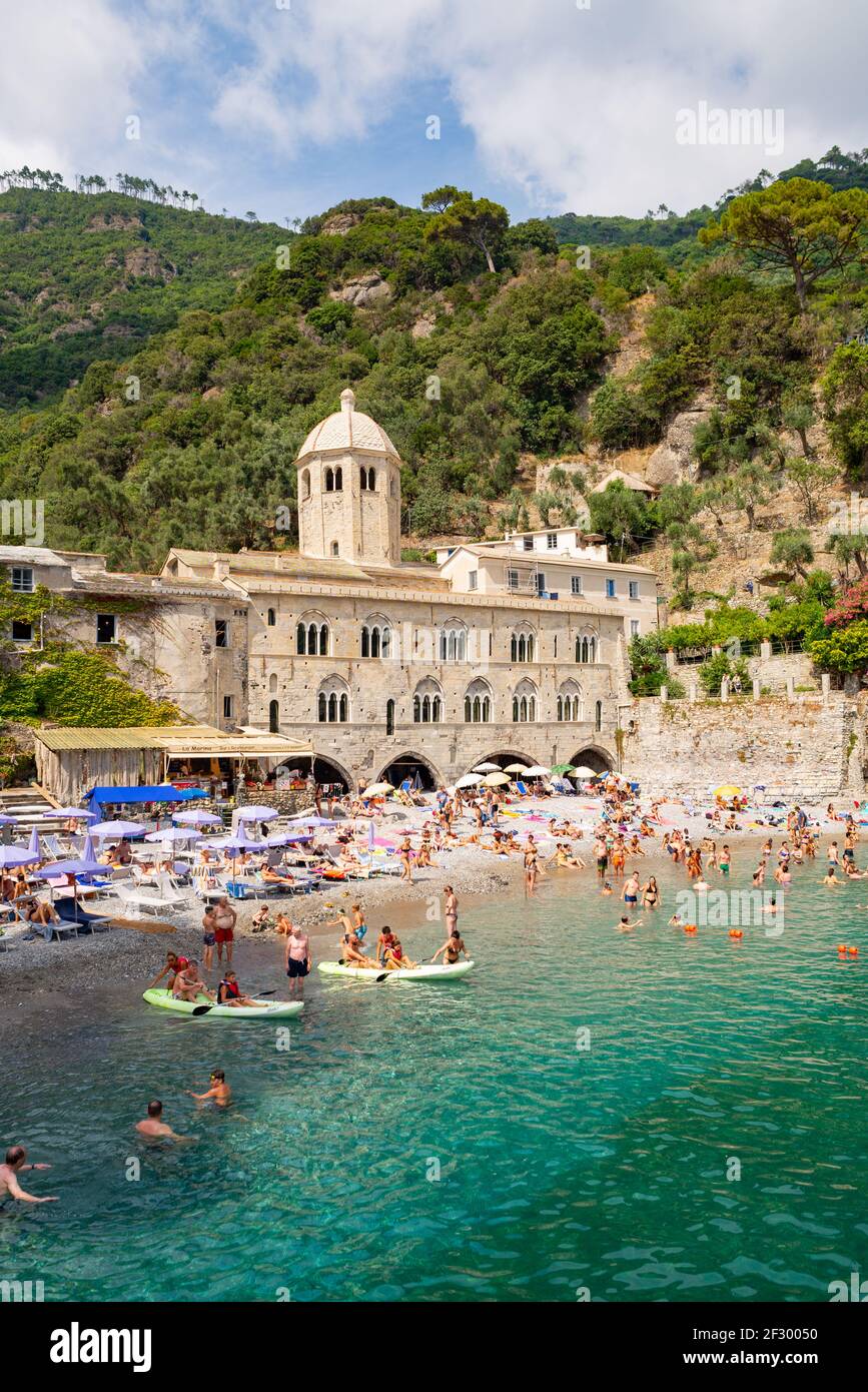 San Fruttuoso beach is just under the old medieval abbey, a site of touristic attraction that cen be reached only by boat or through a hike Stock Photo