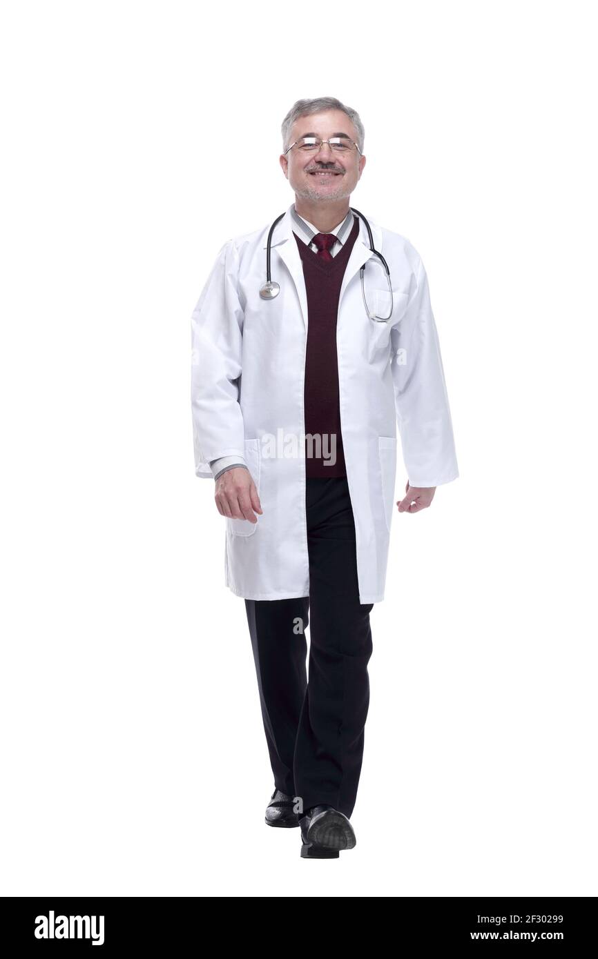 friendly doctor striding towards you. isolated on a white Stock Photo ...