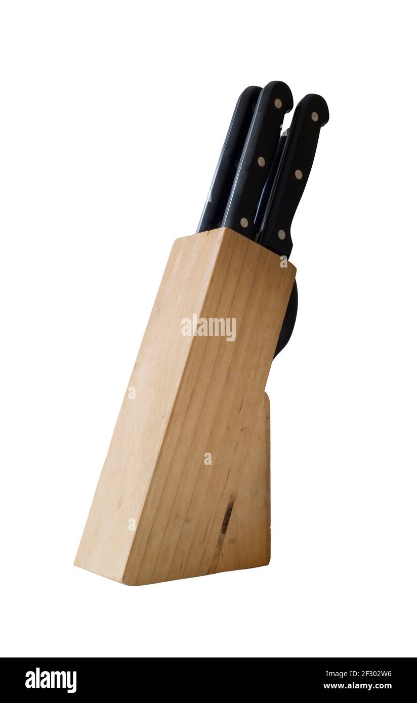 Wooden knife stand on white background. Kitchen accessories close-up Stock Photo