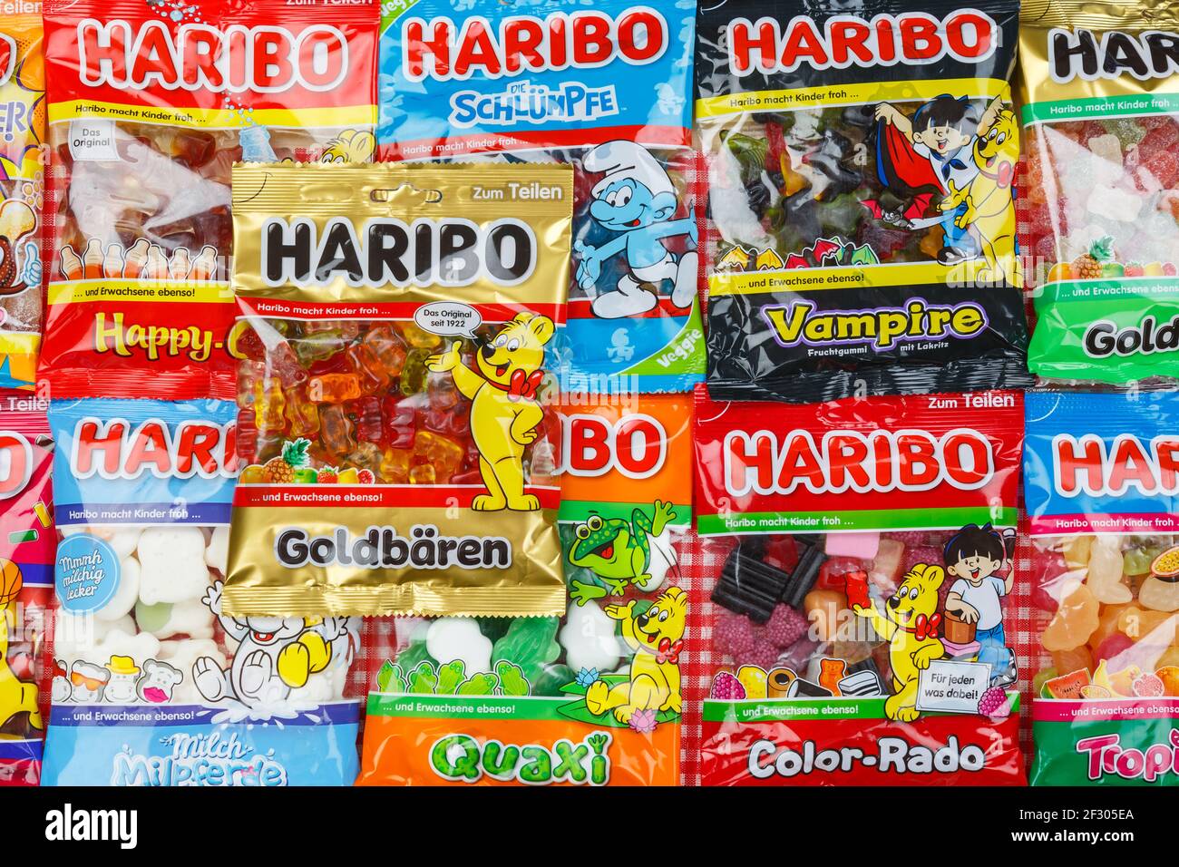 Stuttgart, Germany - March 7, 2021: Haribo gummy bear gummi candy candies different types variety background in Stuttgart, Germany. Stock Photo