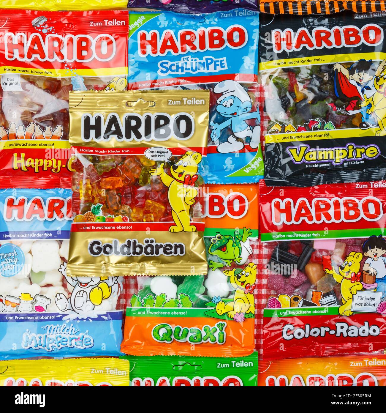 Stuttgart, Germany - March 7, 2021: Haribo gummy bear gummi candy candies different types variety background square in Stuttgart, Germany. Stock Photo