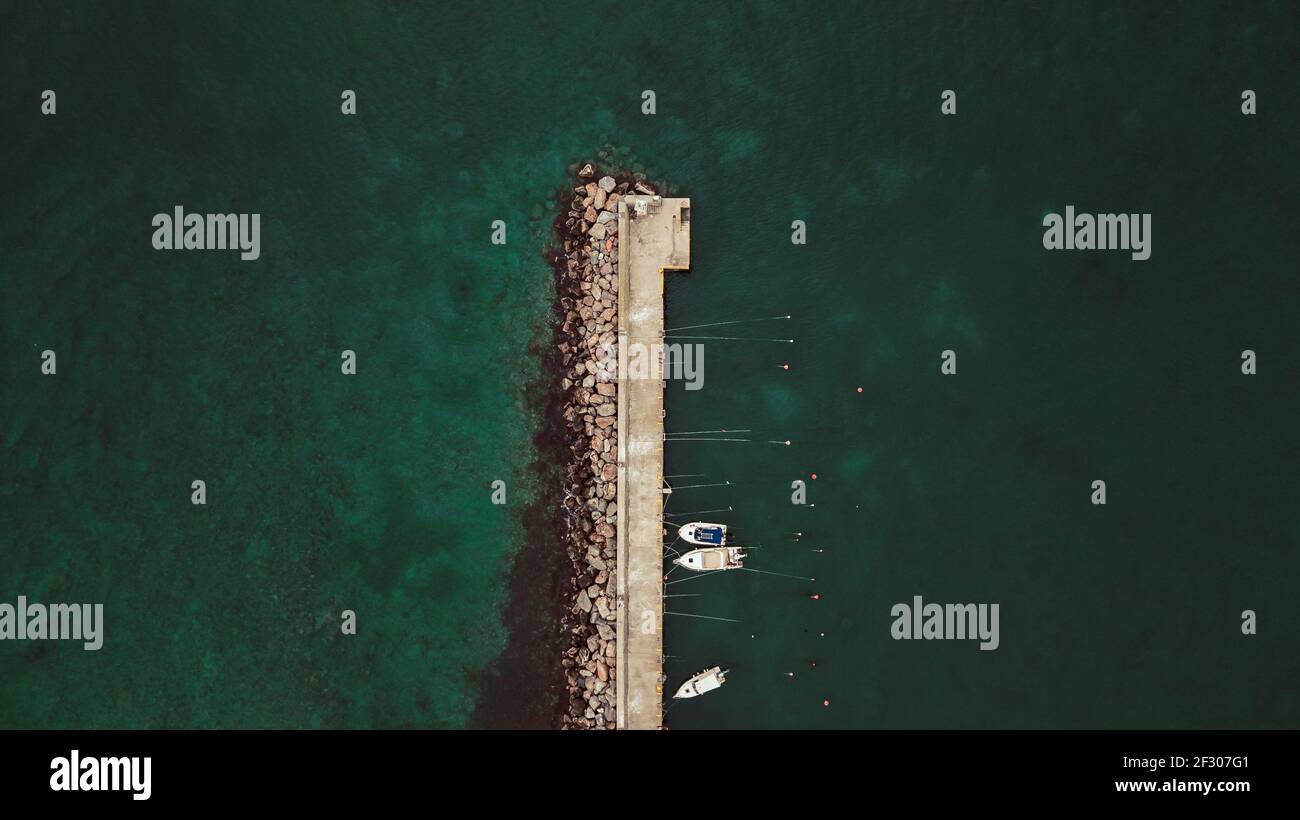 An aerial view of boats mooring at a pier in Greece Stock Photo - Alamy