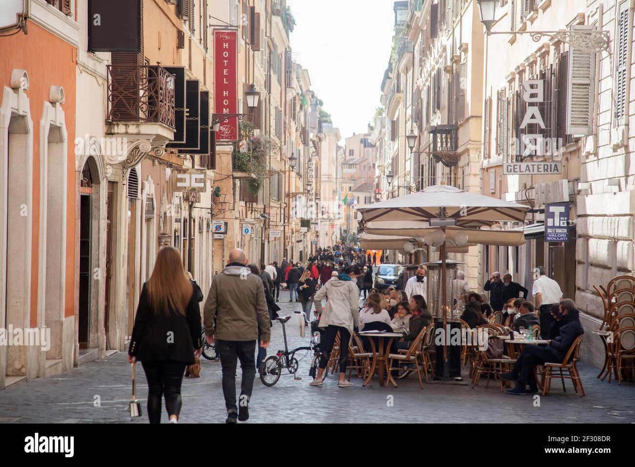 Rome, ITALY- 13 March 2021: People enjoy a sunny day in downtown Rome before the government tightens restrictions across most of the country from March 15, facing a 'new wave' of Covid-19 Stock Photo