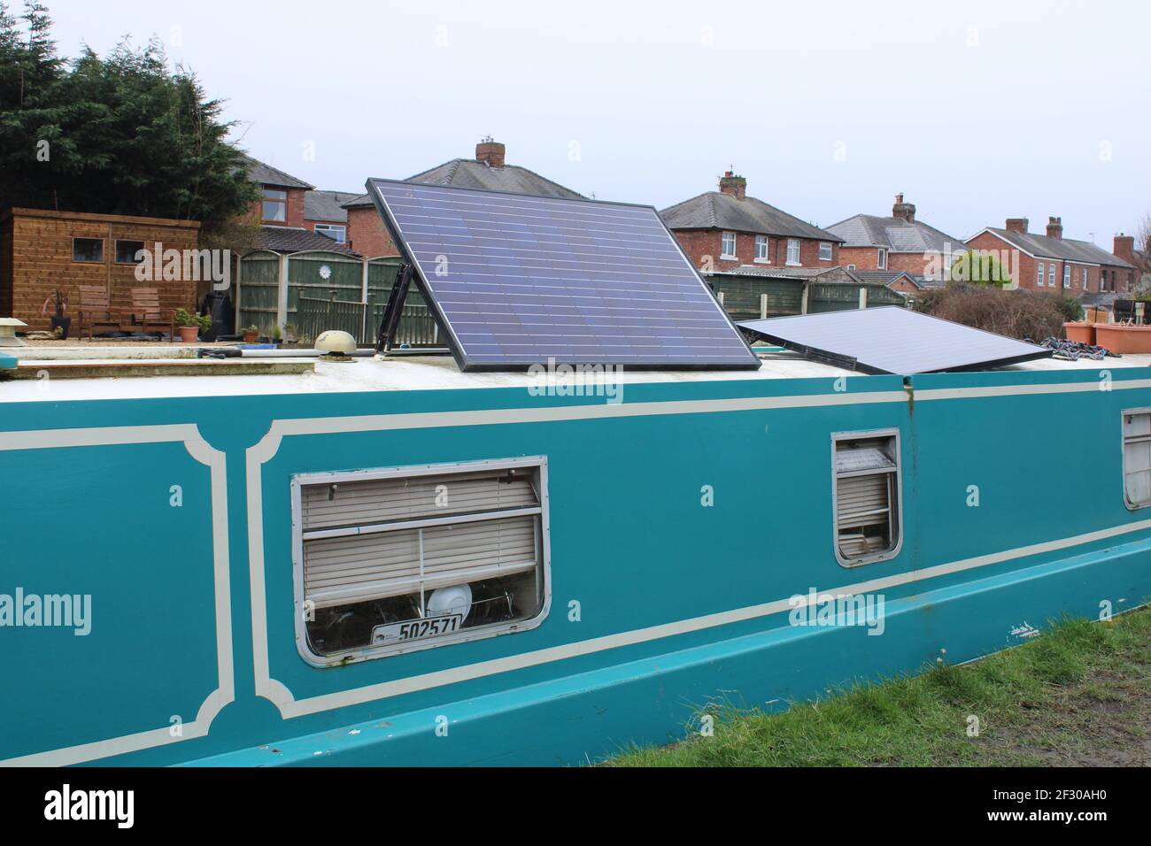 Solar panel on top of a canal boat. Living off grid concept Stock Photo