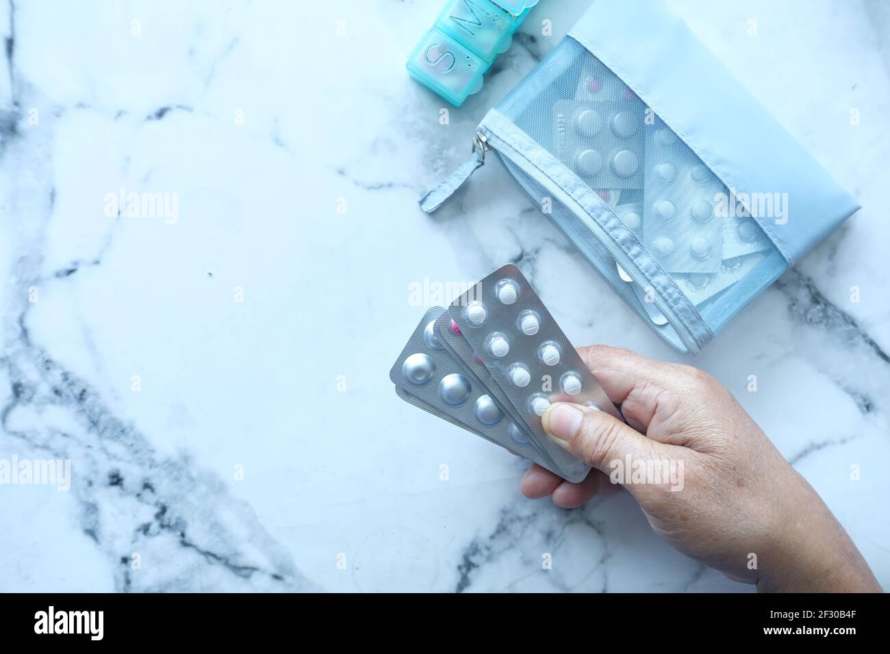 top view of senior man hand holding blister packs with copy space Stock Photo Alamy