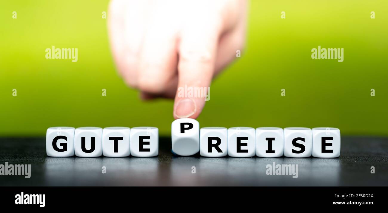 Dice form the German expression 'gute Preise' (good value) and 'gute Reise' (good travel). Stock Photo
