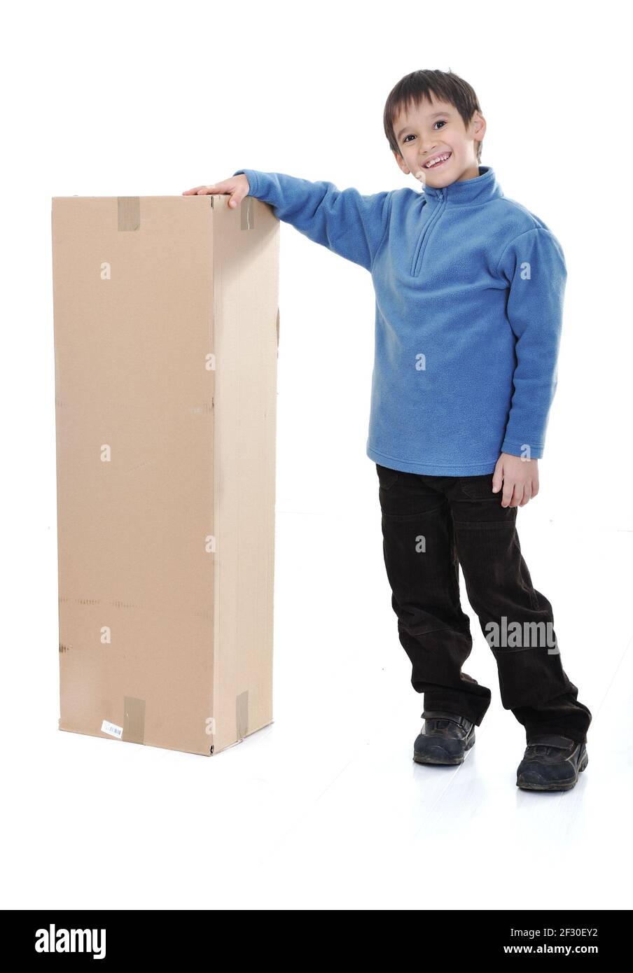 Kid with paper box isolated Stock Photo - Alamy