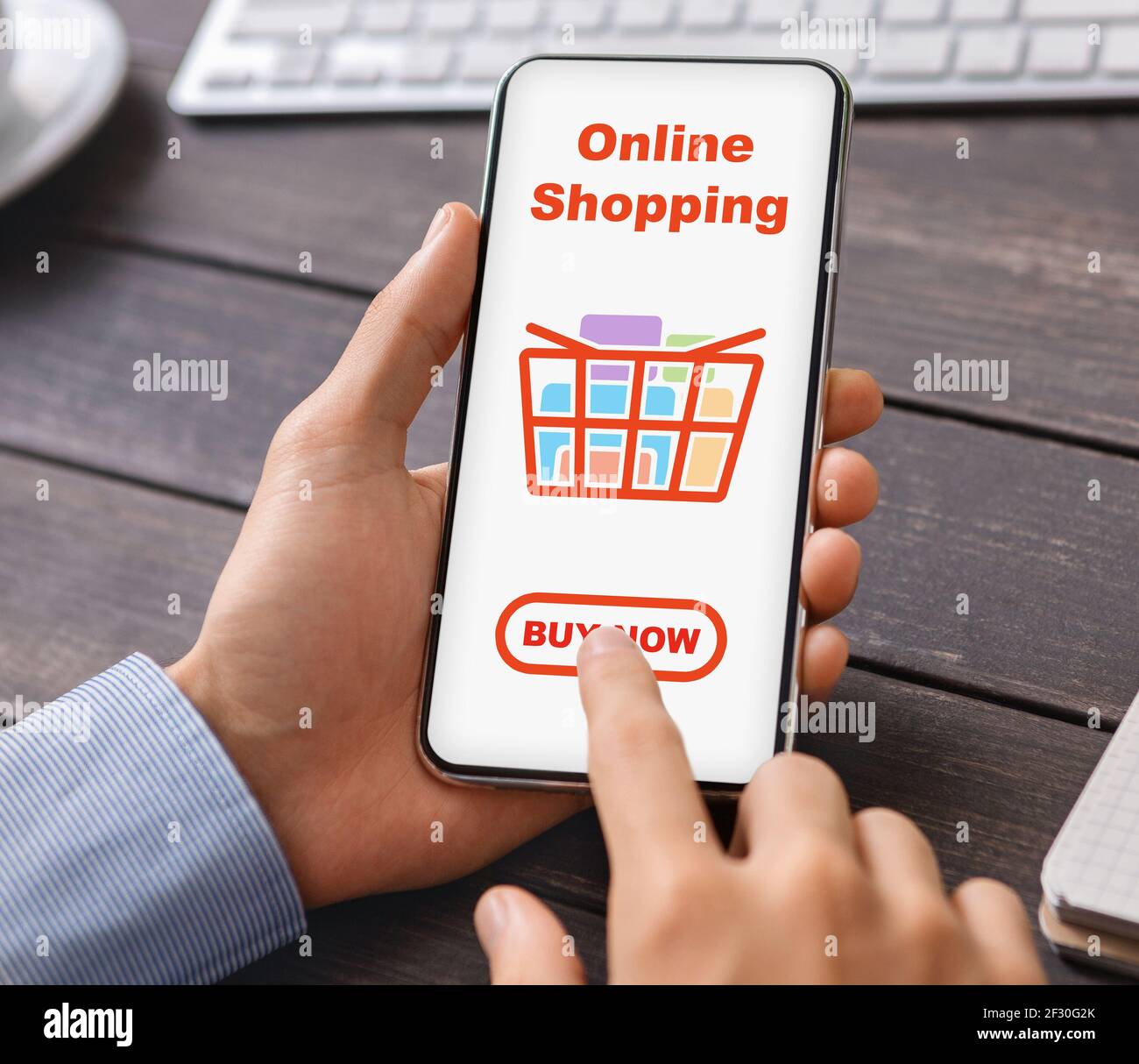 Male hands holding mobile phone with online shopping application Stock ...