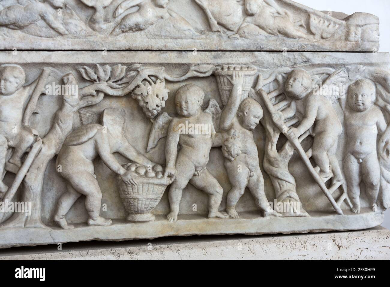 Relief on the ancient sarcophagus in the baths of Diocletian in Rome ...