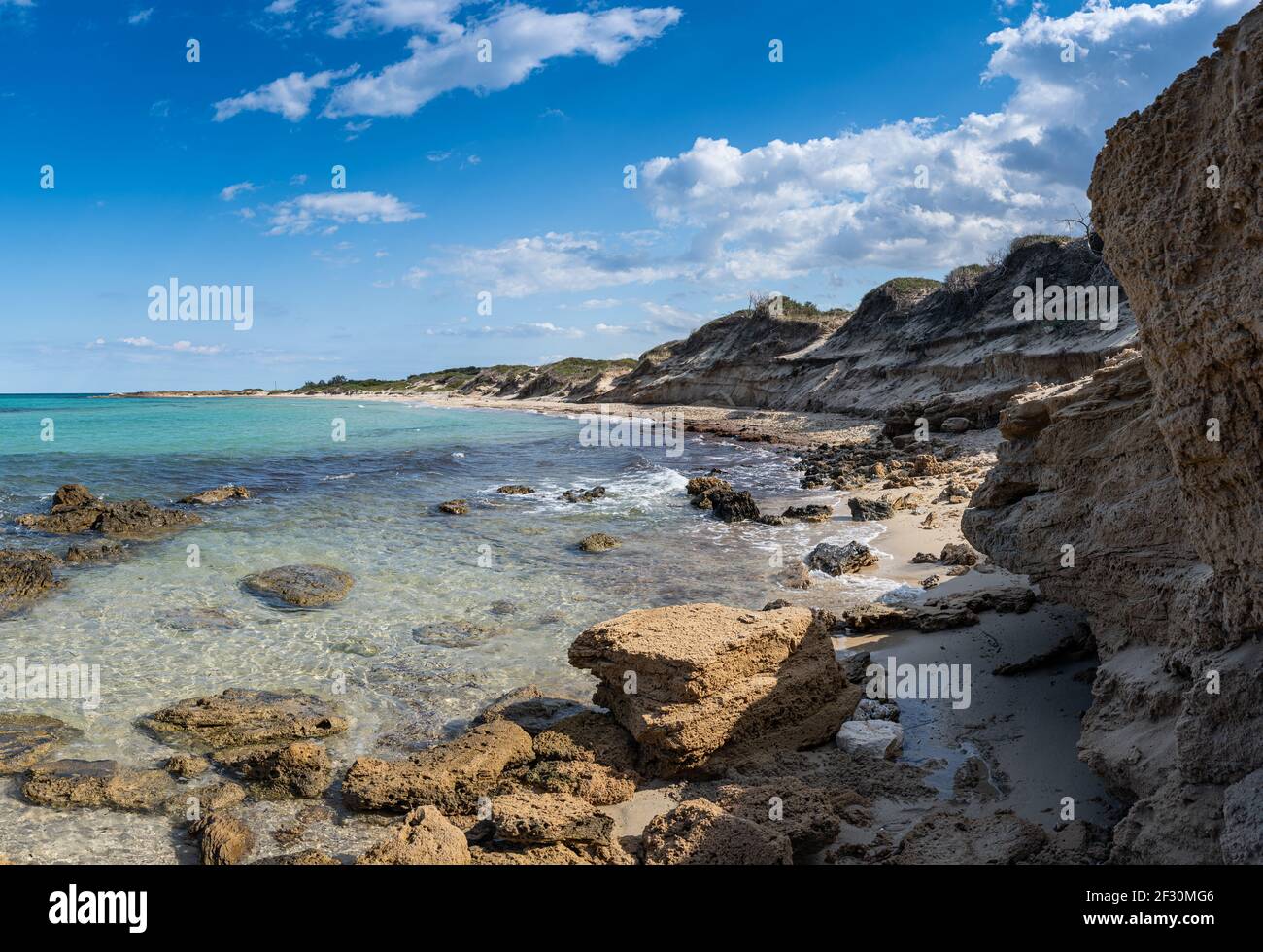 Beach hike to the Torre Guaceto in Apulia, Italy through the maritime nature reserve Stock Photo