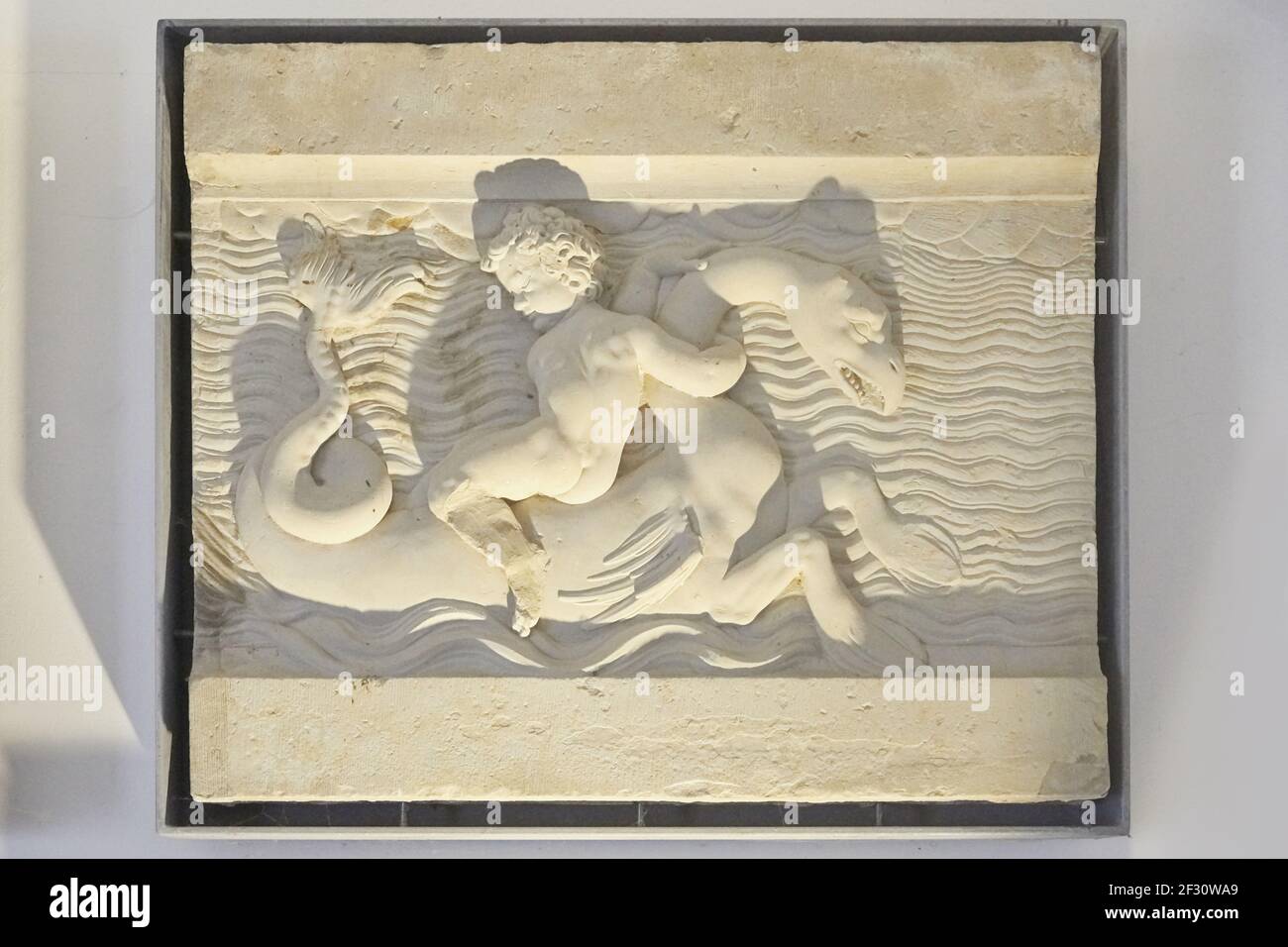 Nice little reliefs with putti and sea monsters. Stock Photo