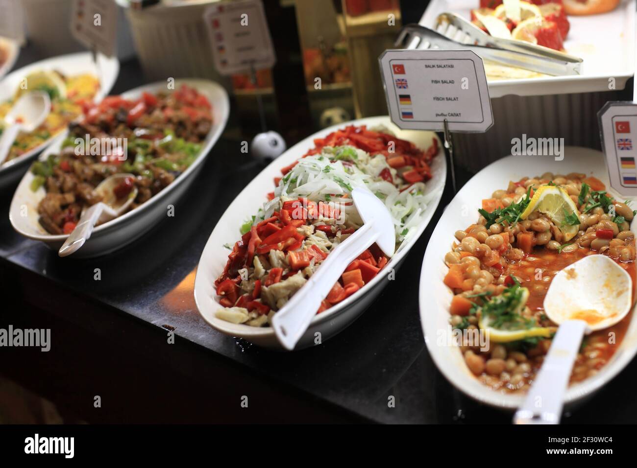 Various salads on the plates at a buffet Stock Photo Alamy