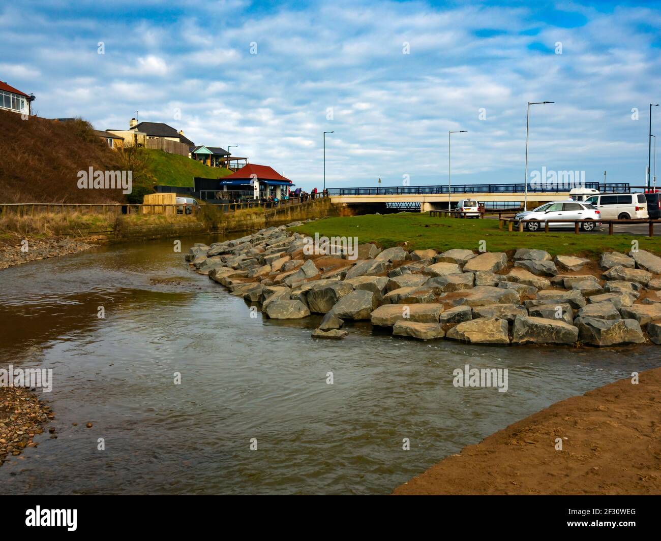 The bank of Skelton Beck reinforced with rock armour by Camfields