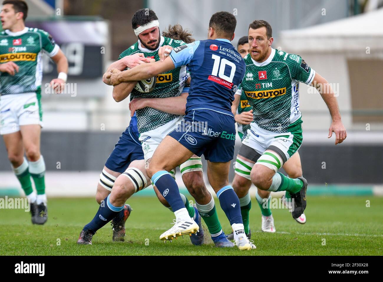 Treviso, Italy. 14th Mar, 2021. Riccardo Favretto (Benetton Treviso)  tackled by Ben Thomas (Cardiff) during Benetton Treviso vs Cardiff Blues,  Rugby Guinness Pro 14 match in Treviso, Italy, March 14 2021 Credit: