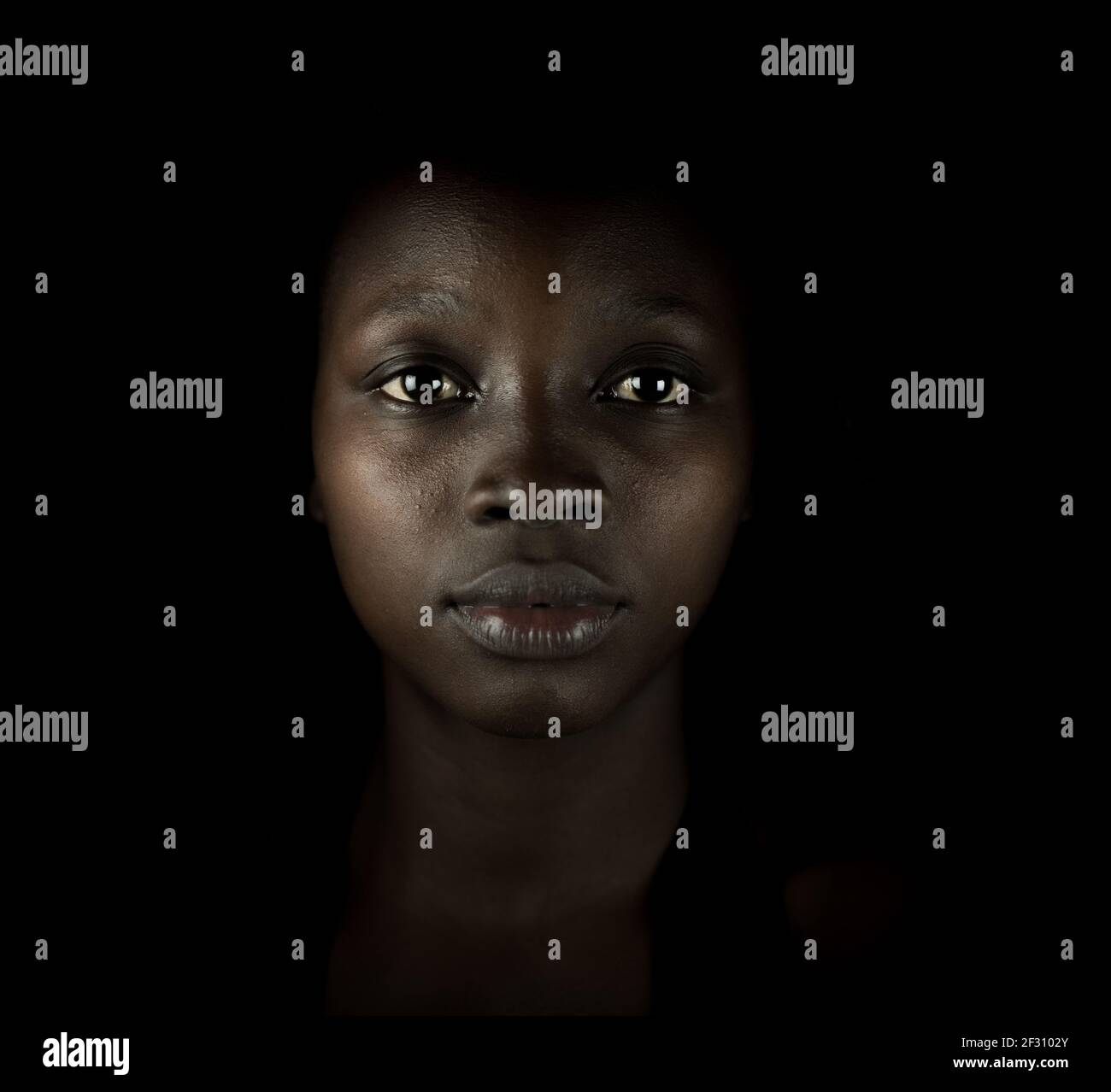 Young black African American woman portrait indoors Stock Photo - Alamy