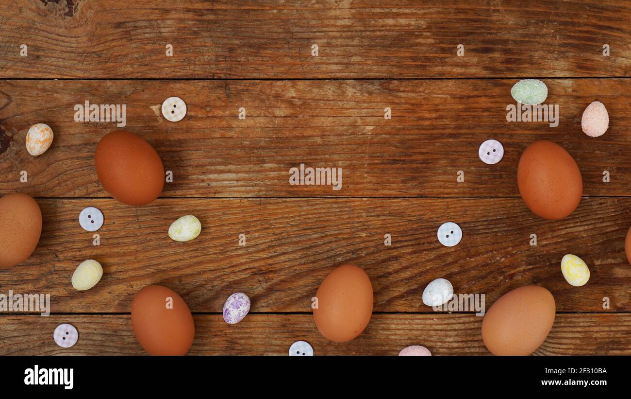 Eggs on a wooden rustic background with copy space for text. Stock Photo