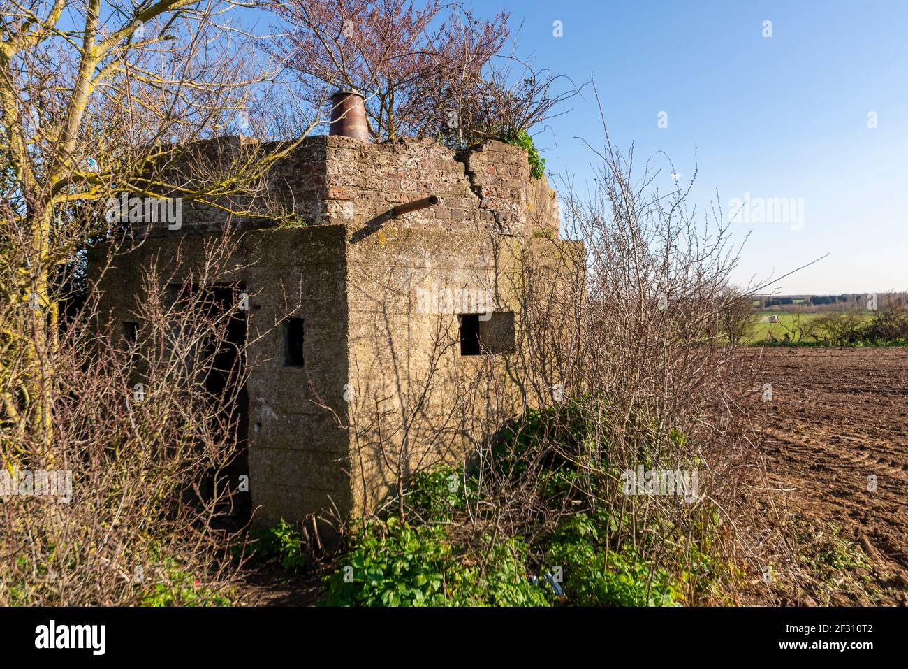 Wartime defence system on site of old RAF Chain Home radar station in Canewdon, Essex, UK. Gardiners Lane. Overgrown and decaying Stock Photo