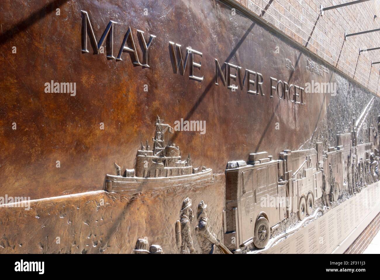 FDNY Memorial Wall in Lower Manhattan honors the firefighters who lost their lives on 9/11 at the World Trade Center, New York City, USA Stock Photo